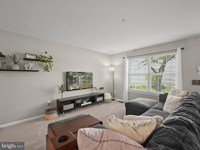 6422 Frothingham Ct, Elkridge, MD 21075 - carpeted living room featuring baseboards
