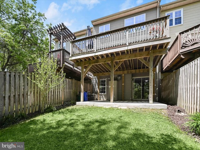 6422 Frothingham Ct, Elkridge, MD 21075 - rear view of house with a wooden deck and a patio area