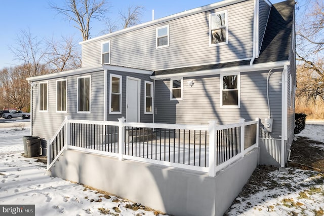 view of snow covered house