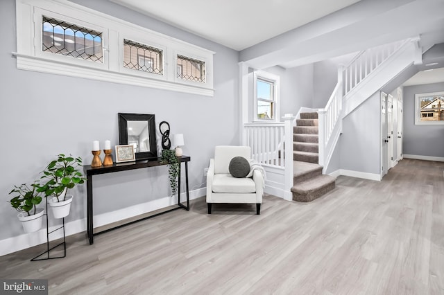 sitting room featuring light wood-type flooring