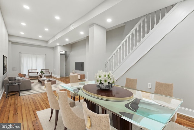 dining space featuring hardwood / wood-style flooring