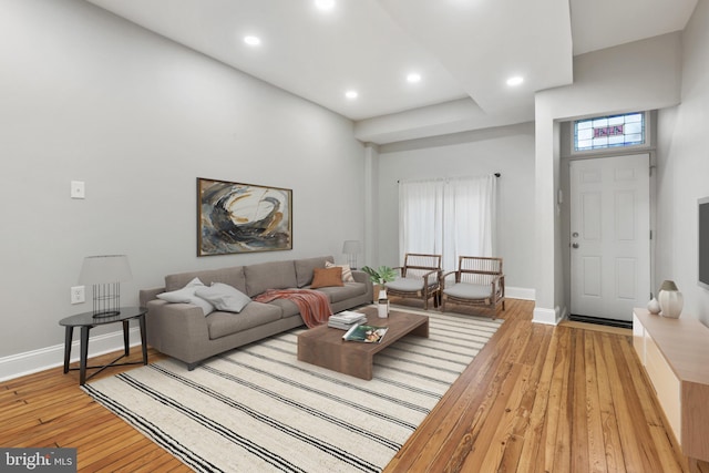 living room with light hardwood / wood-style floors