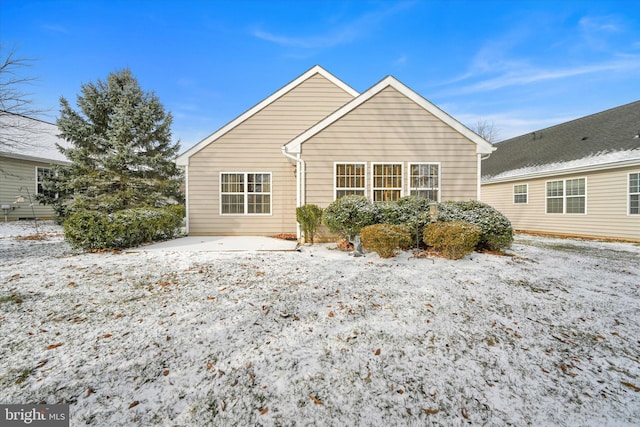 view of snow covered property