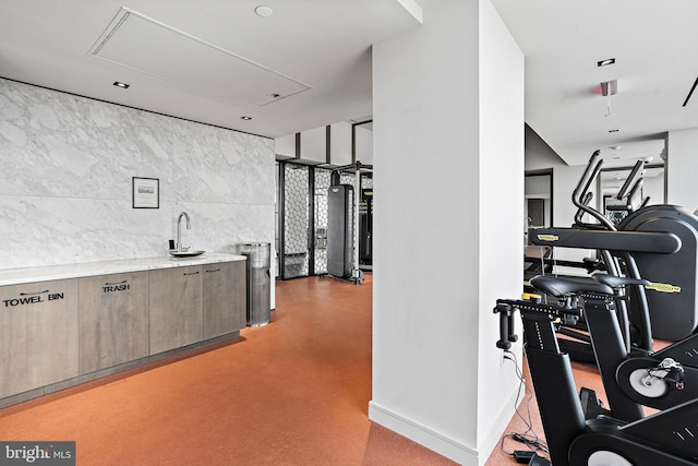 interior space featuring water heater and sink