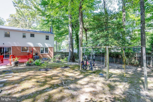 view of yard featuring central air condition unit and fence private yard