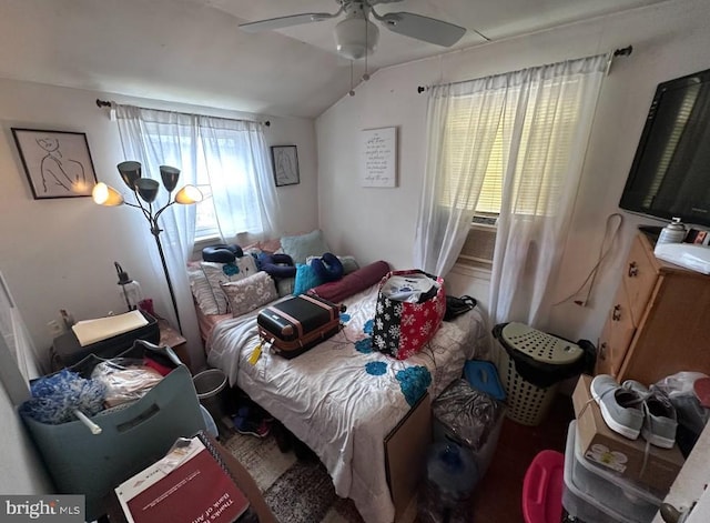 bedroom featuring lofted ceiling and ceiling fan