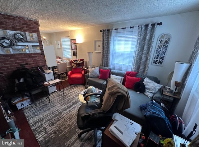 living room with a textured ceiling