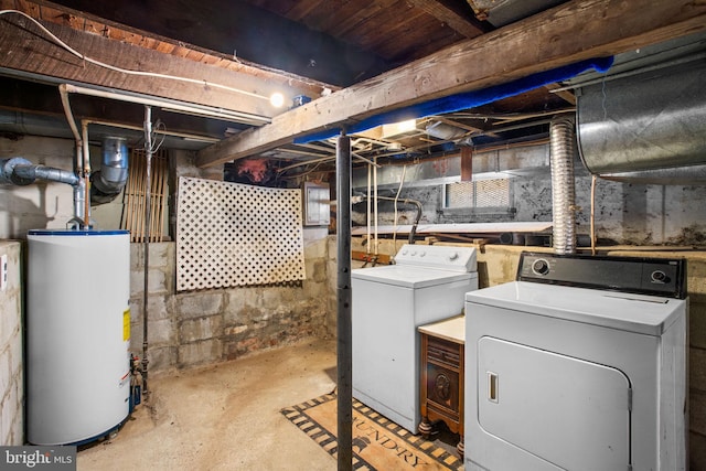 basement with gas water heater and independent washer and dryer