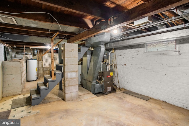 basement featuring gas water heater