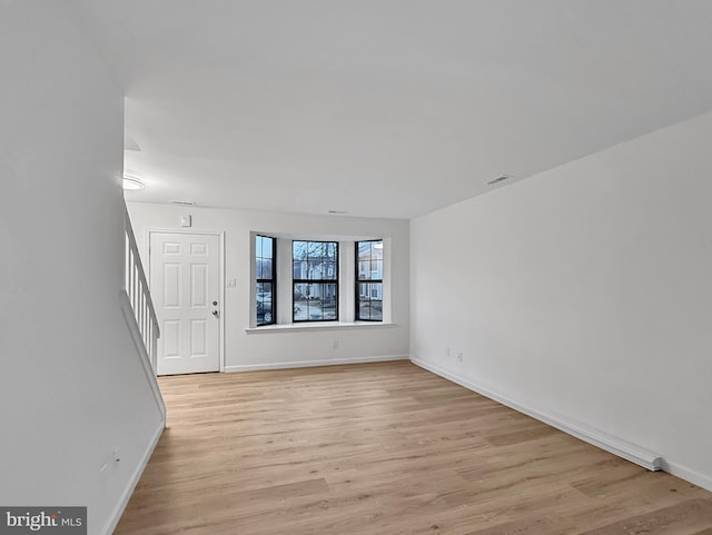 interior space with light hardwood / wood-style floors