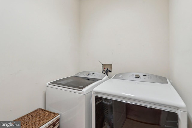 laundry area featuring independent washer and dryer