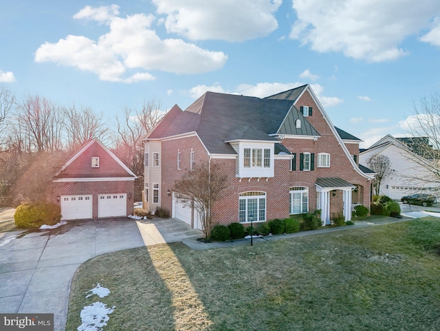 view of front of home featuring a garage and a front yard