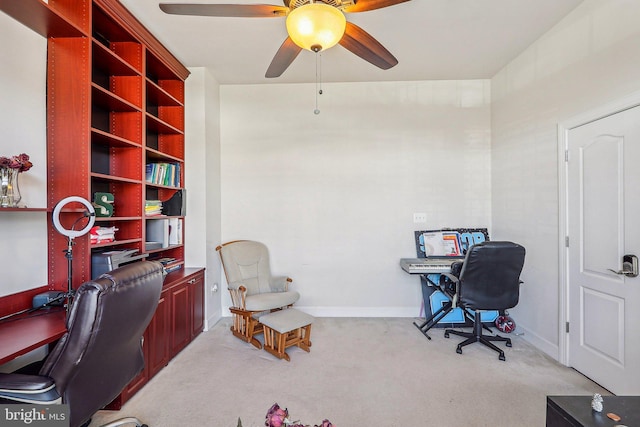 office with light colored carpet and ceiling fan