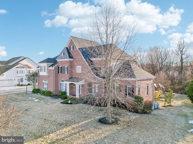 view of front of property with a front lawn