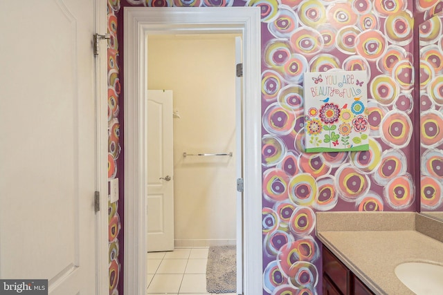 bathroom with vanity and tile patterned flooring