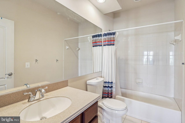 full bathroom featuring vanity, toilet, tile patterned flooring, and shower / tub combo