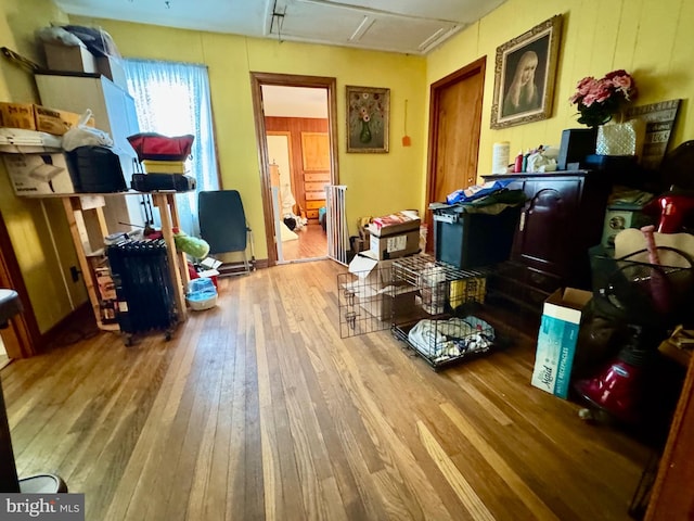 miscellaneous room featuring wood-type flooring