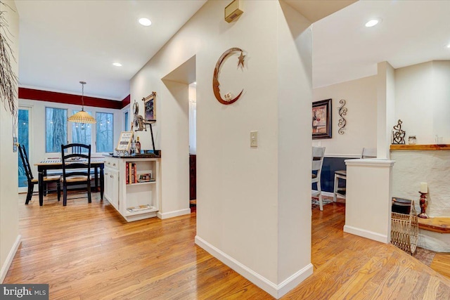 hallway with light wood-type flooring