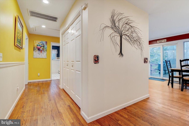 hallway featuring light wood-type flooring