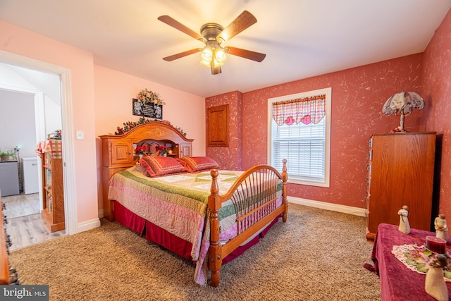 bedroom featuring ceiling fan and carpet