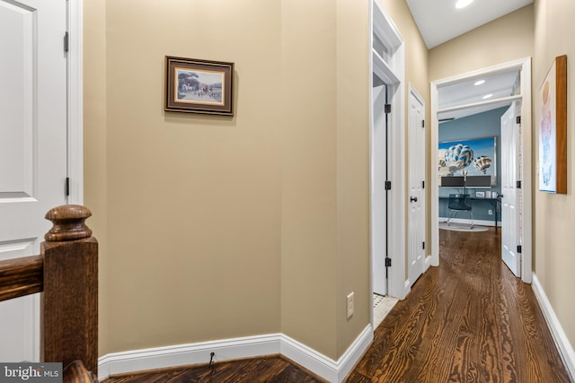 hall with wood-type flooring