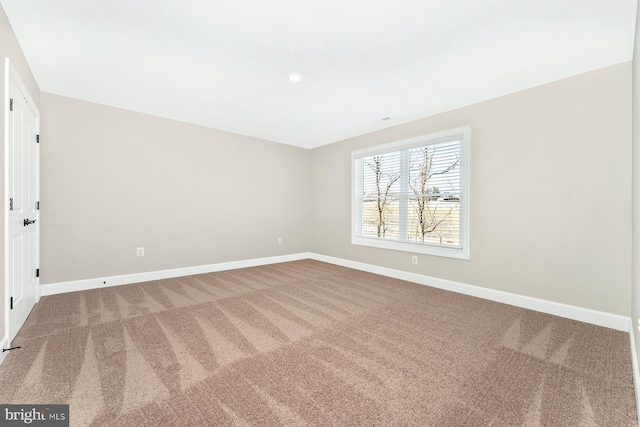 view of carpeted spare room