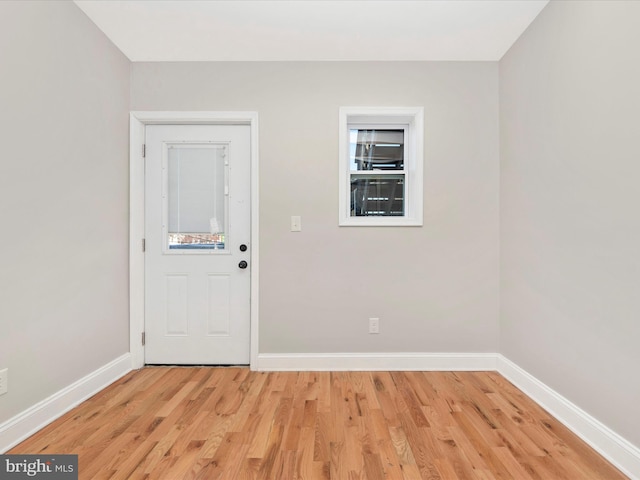 foyer entrance featuring light hardwood / wood-style flooring