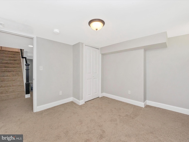 basement with carpet flooring