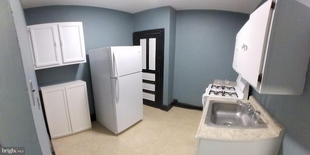 laundry area with sink