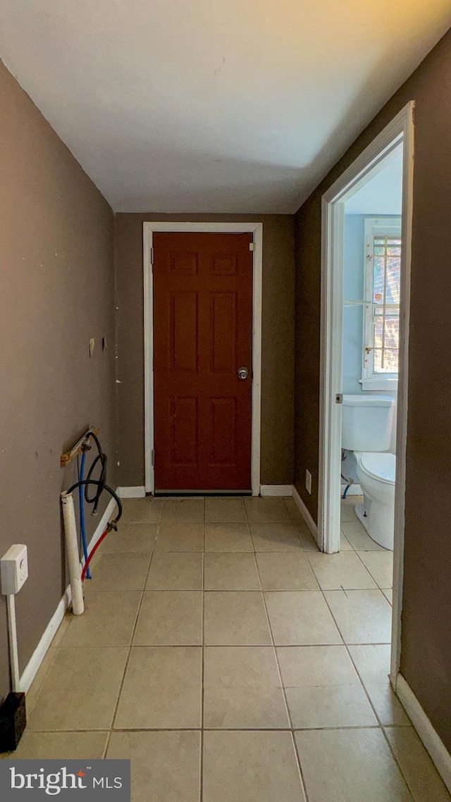 interior space with light tile patterned floors