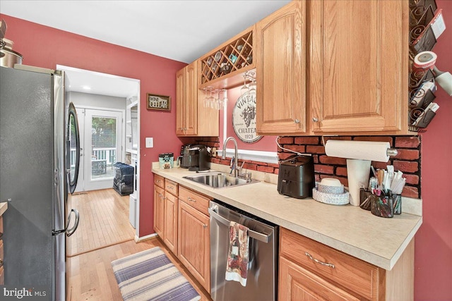 24200 Log House Rd, Gaithersburg, MD 20882 - kitchen featuring stainless steel appliances, light countertops, and light wood finished floors