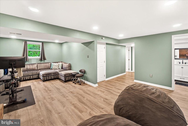 24200 Log House Rd, Gaithersburg, MD 20882 - living area with wood finished floors and recessed lighting