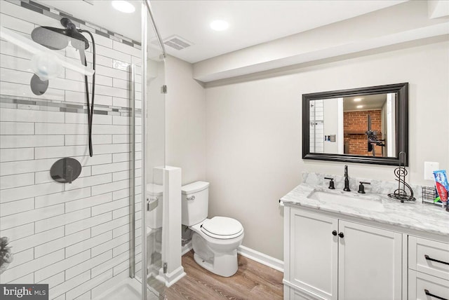 24200 Log House Rd, Gaithersburg, MD 20882 - bathroom featuring vanity, wood finished floors, a stall shower, and recessed lighting