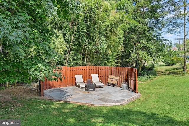 view of yard featuring a patio area and fence