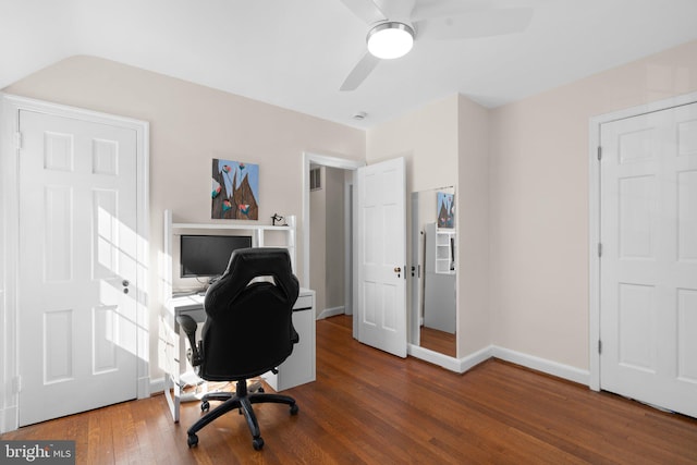 office area featuring ceiling fan, wood-type flooring, visible vents, and baseboards