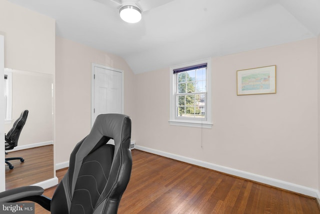 office area with lofted ceiling, hardwood / wood-style floors, and baseboards