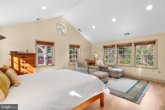 bedroom with recessed lighting, visible vents, and wood finished floors