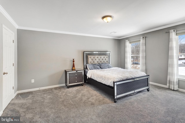 bedroom featuring ornamental molding, carpet floors, and multiple windows