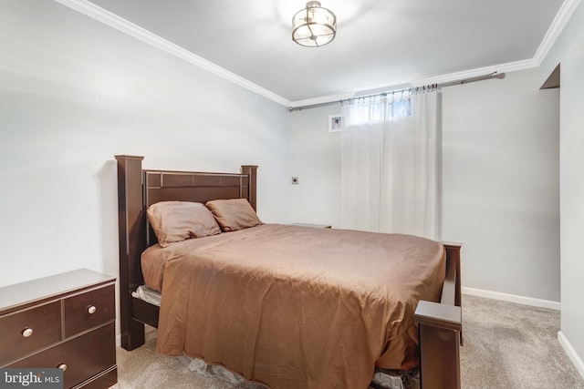 carpeted bedroom featuring crown molding