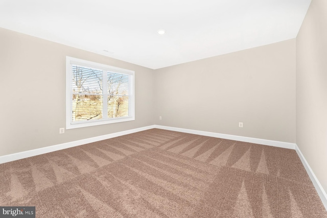 spare room with carpet flooring