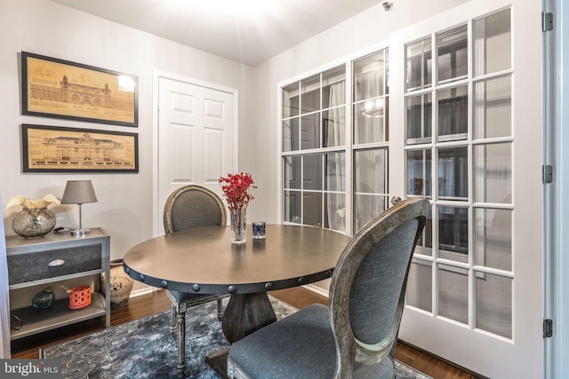 dining area with hardwood / wood-style flooring