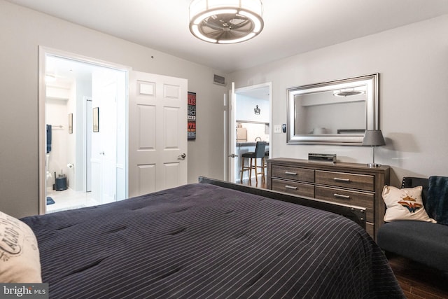 bedroom featuring hardwood / wood-style flooring