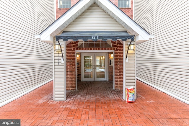 doorway to property featuring french doors and a patio