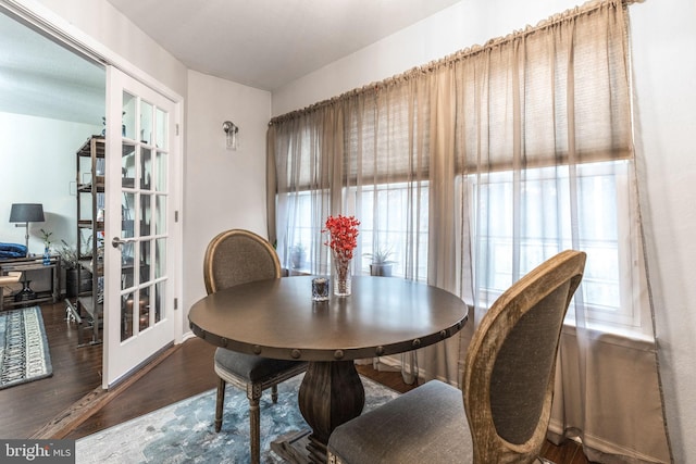 dining room featuring dark wood-type flooring and french doors