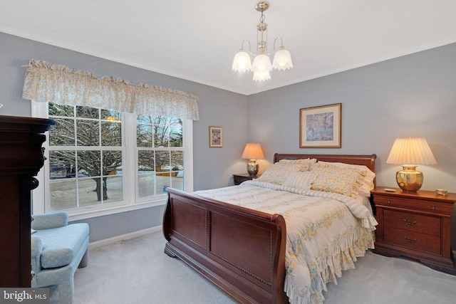 bedroom featuring crown molding, light carpet, and a notable chandelier