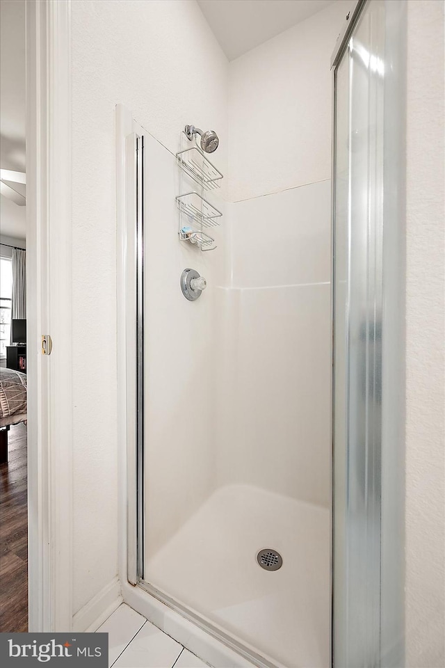 bathroom with an enclosed shower