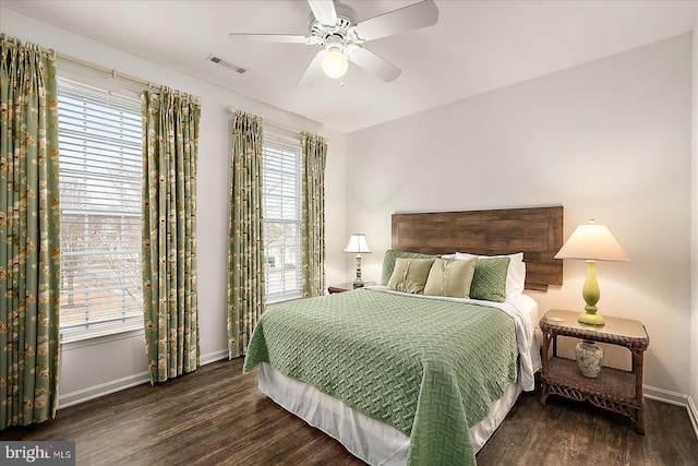 bedroom featuring dark wood-type flooring and ceiling fan