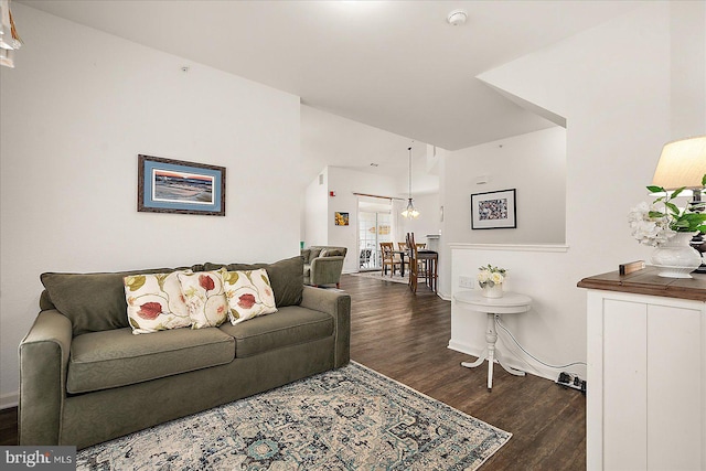 living room featuring dark hardwood / wood-style flooring