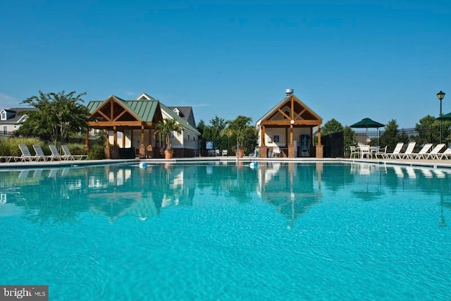 view of swimming pool with a gazebo