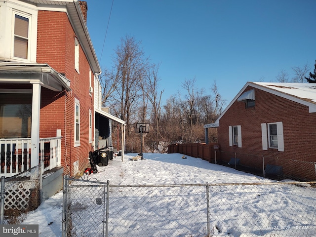 view of snow covered property